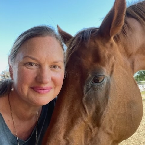 Photo of Jennifer and her horse Calvin